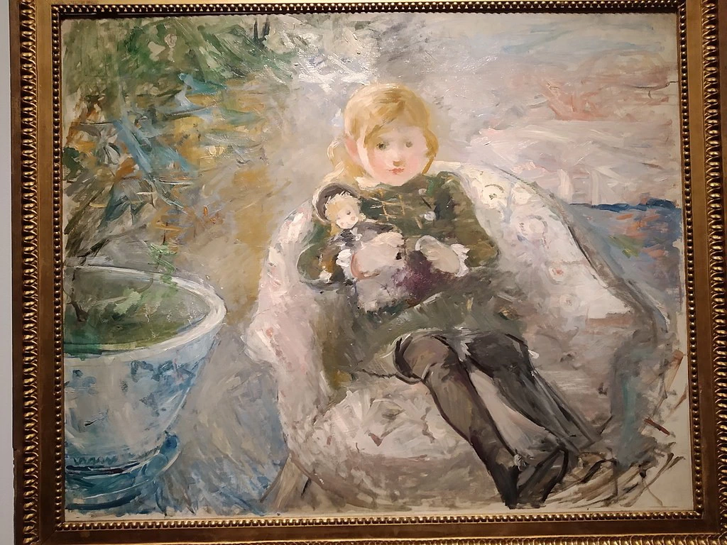 Bambina con la bambola